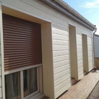 Traitement et peinture de bardage 78